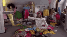 Tearing through a closet full of clothes